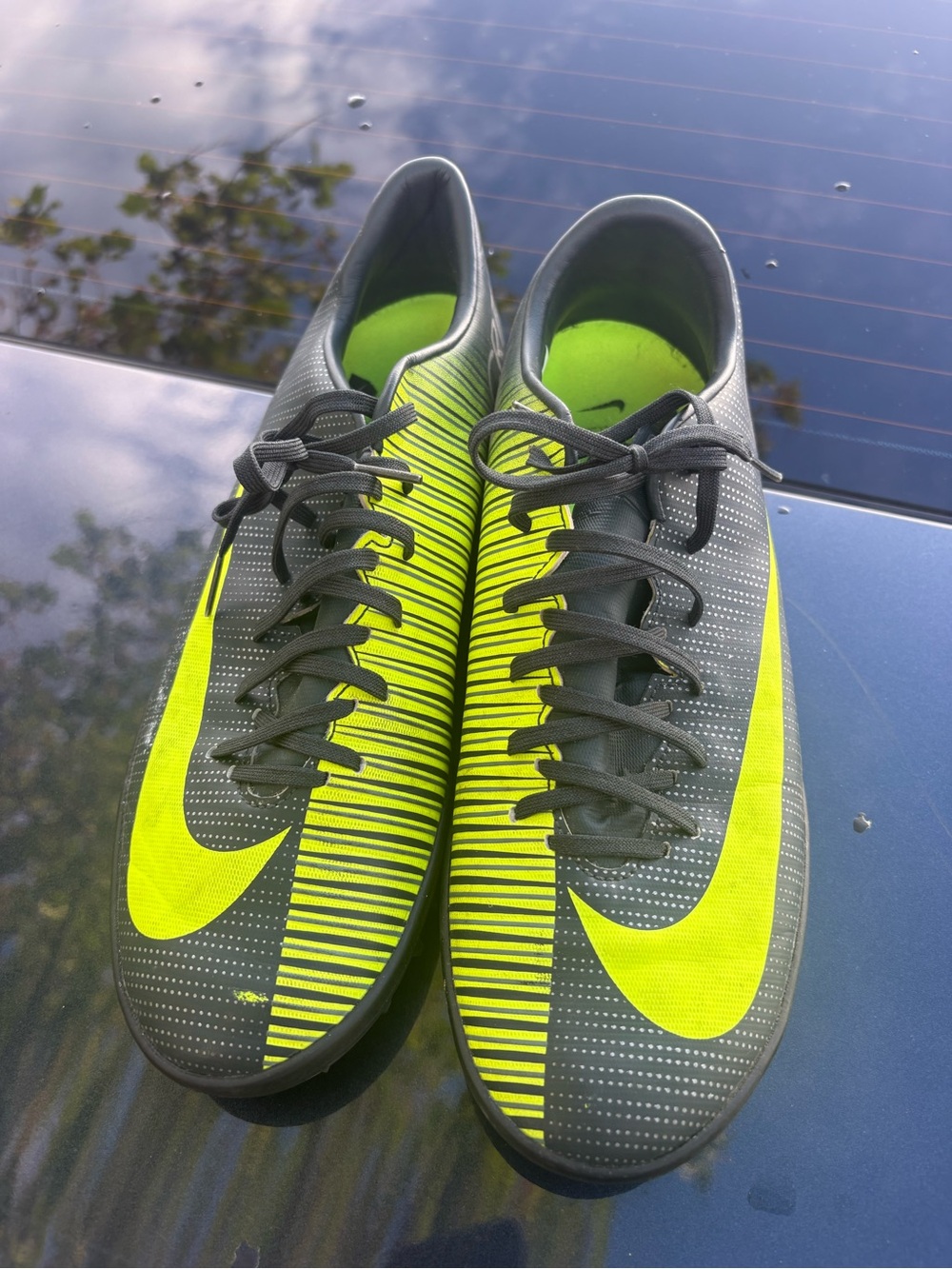 Nike Black and Volt Striped Soccer Shoes